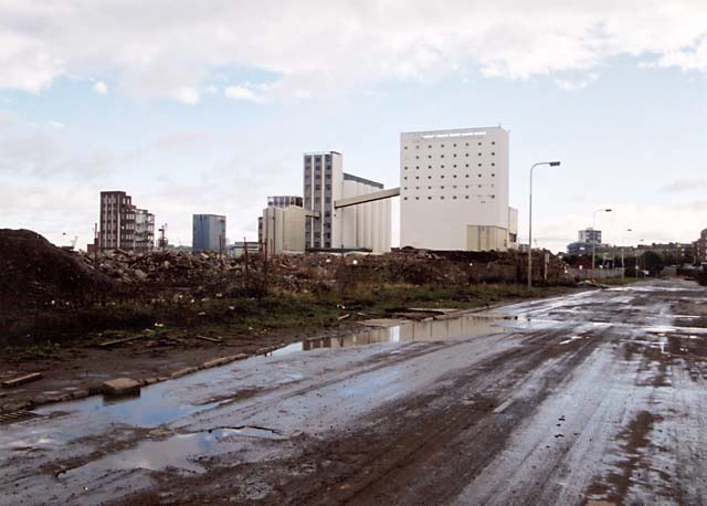 Caledonia Mill and Chancelot Mill  -  seen from the west in Leith Western Harbour  -   Photographed November 2004