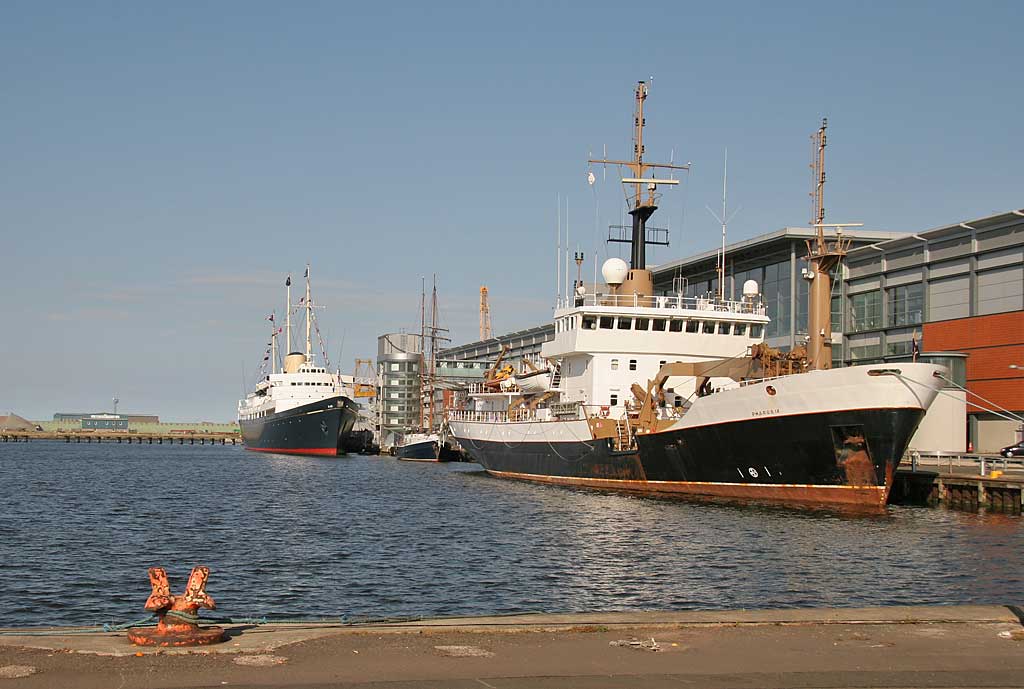 The Royal Yacht Britannia and the Northern Lighthouse Board ship, Pharos IX, moored in Leith Western Harbour beside Ocean Terminal
