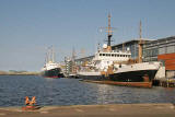 The Royal Yacht Britannia and the Northern Lighthouse Board ship, Pharos IX, moored in Leith Western Harbour beside Ocean Terminal