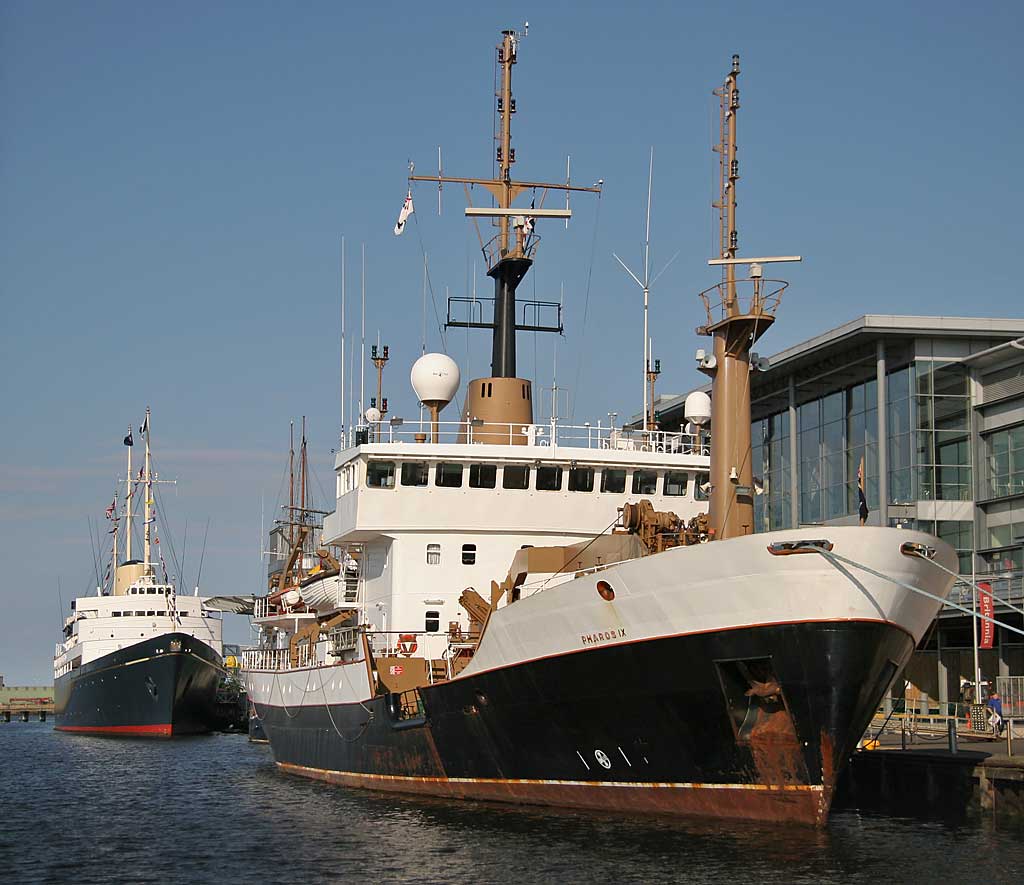 The Royal Yacht Britannia and the Northern Lighthouse Board ship, Pharos IX, moored in Leith Western Harbour beside Ocean Terminal