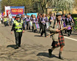 The march from Princes Street and George IV Bridge approaches the Meadows, down Middle Meadows Walk