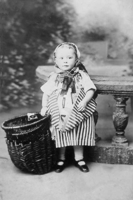 Photograph of a girl aged two, dressed in Newhaven Fishwives' Costume  -  American Studios