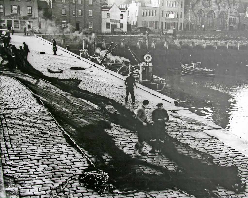 Fishing nets laid out on the slipway at Newhaven Harbour