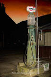 Old petrol pump at Peebles  -  black and white photograph, 2006