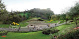 A possible new bandstand for Princes Street Gardens.  Style:  grassy knoll  -  daytime illustration