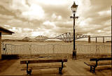 Queeensferry  -  The Forth Bridge with railings, lamp posts and benches