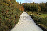 Looking to the north, away from the Rosebery Reservoir, Midlothian, from a bridge on the  road running past the northern end of the reservoir