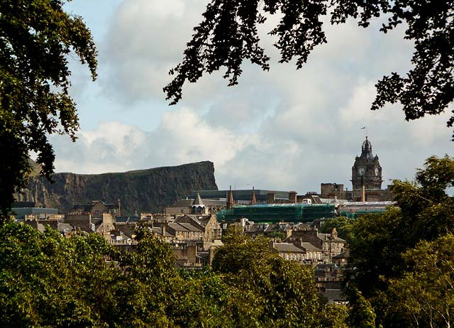 View to Salisbury Crags and the clock tower of the Balmoral Hotel at the East End of Princes Street, from the Royal Botanic Garden, Inverleith, Edinburgh