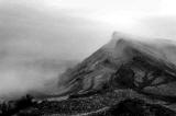 Salisbury Crags in Holyrood Park, in the mist  -  A photograph by Wullie Croal