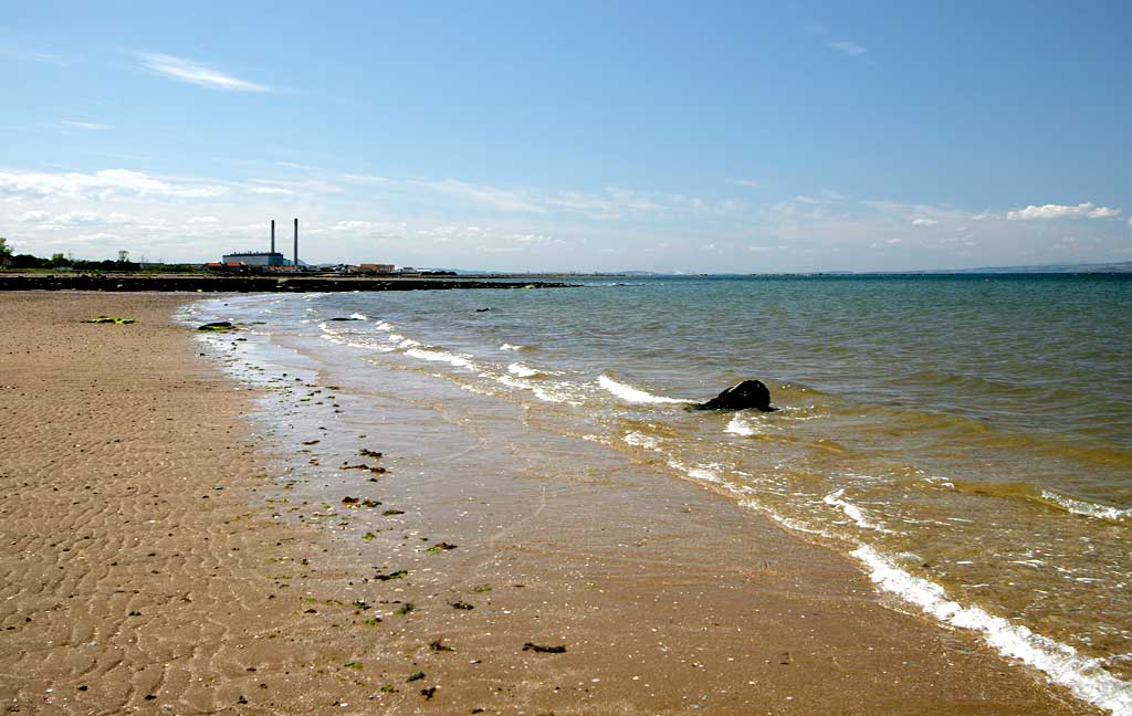 Seton Sands  -  looking to the west down the coast of the Firth of Forth, at low tide, towards Cockenzie Power Station