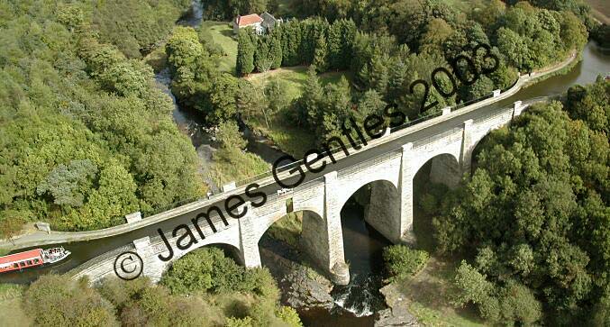 A Kite Aerial Photograph by James Gentles of a narrowboat approaching Lin's Mill Aquaduct on the Union Canal, near Edinburgh