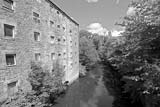 Looking NE, downstream, along the Water of Leith from Dean Path Bridge towards the church standing at the NW corner of Dean Bridge