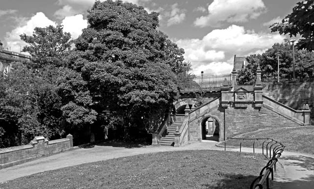 Looking NE, downstream, along the Water of Leith from Dean Path Bridge towards the church standing at the NW corner of Dean Bridge