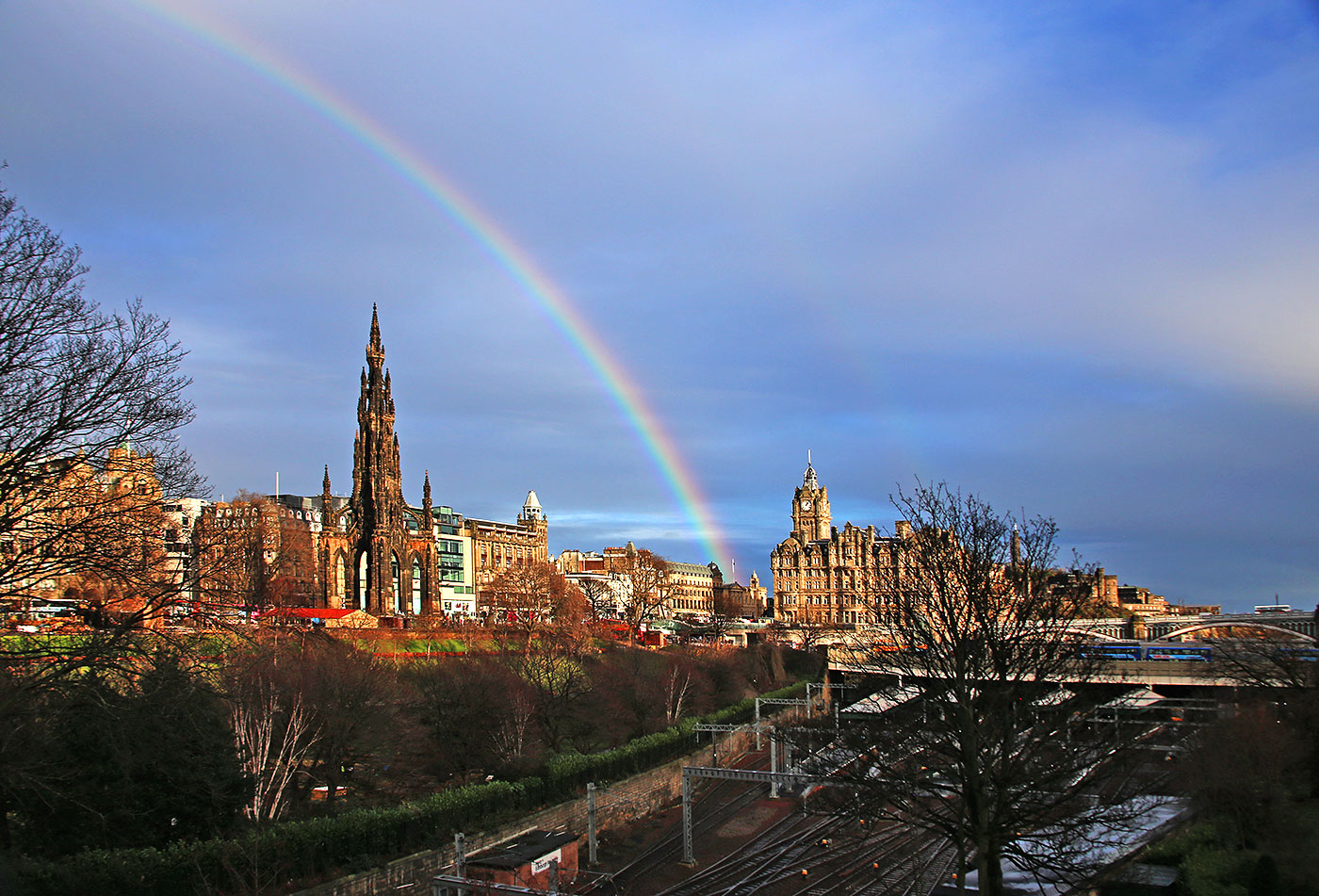 Views of Waverley, including The Scott Monument and Balmoral Hotel from near the Royal Scottish Academy and National Gallery of Scotland at the foot of The Mound.