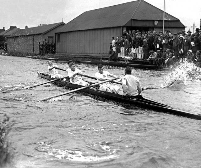 Rowing on the Union Canal beside the Edinburgh University Boat Club boathouse at Meggetland, Edinburgh