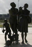 Edinburgh Waterfront  -  The sculpture 'Going to the Beach' in the centre of Saltire Square  -  zoom-in to the figures