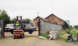 Edinburgh Waterfront  -  The entrance to William Waugh's scrap yard at West Harbour Road, Granton  -  25 August 2002