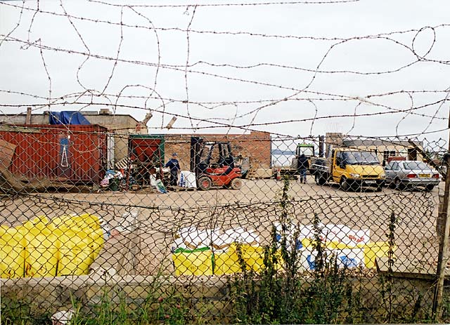 Edinburgh Waterfront  -  Granton Builders and barbed wire  -  25 August 2002