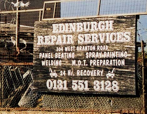 Zoom-in to the sign for Edinburgh Repair Services - one of the small businesses in West Granton Road, close to its junction with Crewe Road North  -  5 May 2003