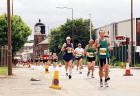 Edinburgh Waterfront  -  The 2003 Edinburgh Marathon passes the lighthouse in West Harbour Road  -  15 June 2003