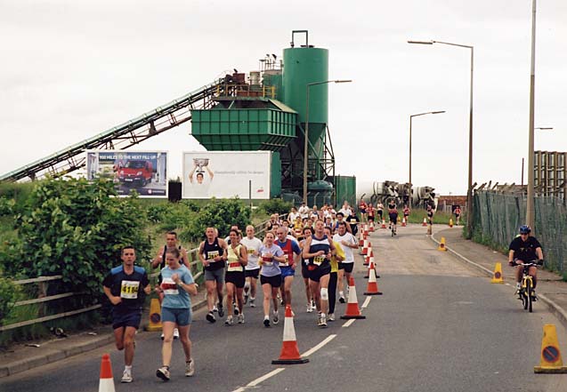 Edinburgh Waterfront  -  The 2003 Edinburgh Marathon passes Hanson's precast cement works in West Shore Road  -  15 June 2003