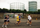 The 2003 Edinburgh Marathon passes along West Shore Road in front of the gasometers