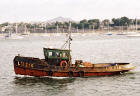 Edinburgh Waterfront  -  LH216 leaving Granton's Western Harbour with Arthue's Seat in the background  -  14 September 2002