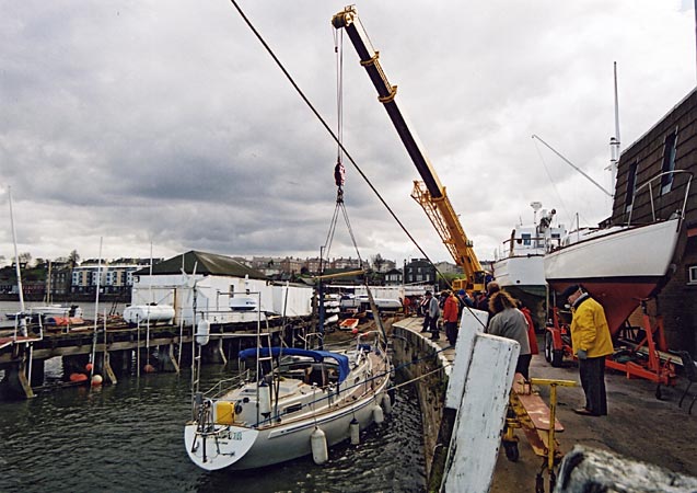 Edinburgh Waterfront  -  Launching a yacht beside the Royal Forth Yacht Club clubhouse on Middle Pier at Granton Harbour  -  7 April 2004