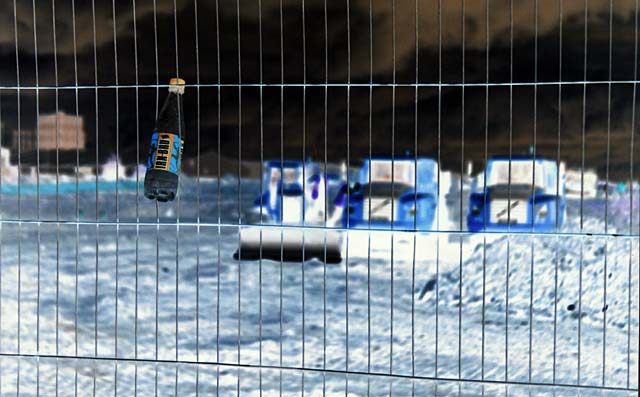 Edinburgh Waterfront  -  Irn Bru Bottle.  In the background, work begins to prepare the land in Granton Western Harbour for developments  -  22 June 2004  -  Negative