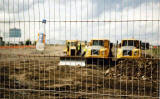 Edinburgh Waterfront  -  Work begins to prepare the land in Granton Western Harbour for developments in the background.  In the foreground is an empty  Irn Bru bottle  -  22 June 2004