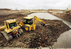 Reclaiming the land in Granton Western Harbour  -  looking to the west from Middle Pier  -  June 2004