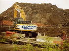 Edinburgh Waterfront  -  Work begins to prepare the land in Granton's Western Harbour  -  A digger, a pile of earth and  Irn Bru bottles  -  5 August 2004