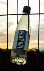 Iron Bru Bottle in the fence separating Middle Pier from the Western Harbour construction site