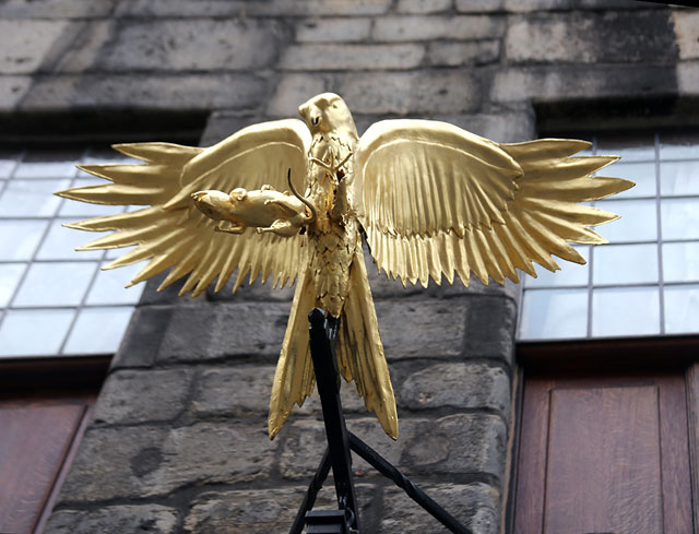 Gladstone's Land - Gilt-copper sign - Hawk with a mouse in its claws