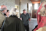 Kenneth Williamson tells a group from the Cockburn Association about the history of Granton Gas Works Station.  This photo was taken from the lower level of the building, standing on one of the old platforms