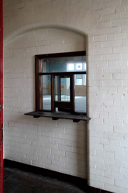 Granton Gas Works Station -  Window at the end of the bridge leading from the top floor of the station building to Granton Gas Works  -  2011