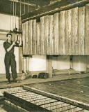 The crane operator at the newly opened ice works, West Shore Road, Granton  -  April 22, 1952