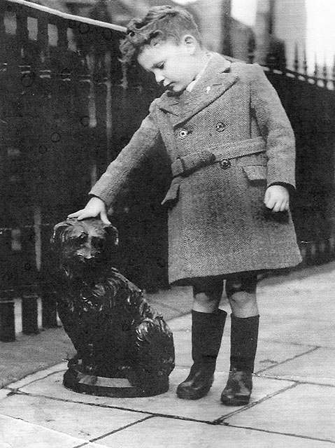 John Taylor, aged about 5 or 6, standing beside the statue of Greyfriar's Bobby - possibly around 1948-49