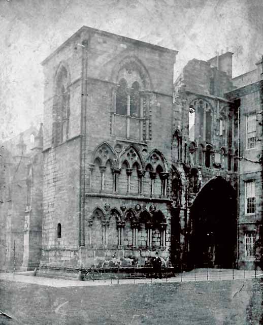 The Head Gardener, W ALexander, standing in front of Holyrood Abbey