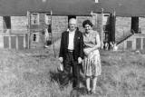 Rob Cleary's grandfather and his daughter outside Jewel Cottages, Bingham  -  around 1946