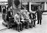 Six men beneath  the Statue to Queen Victoria at the Foot of Leth Walk