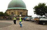 Workers from the Charles Laing & Sons loundry in Edinburgh bring out the new North, South, East and West signs for the Nelson Monument