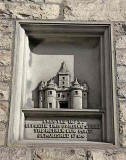 Plaque on the wall at Netherbow Port