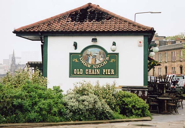 The Old Chain Pier with a damaged roof following a fire  -  view from the west,  April 2004