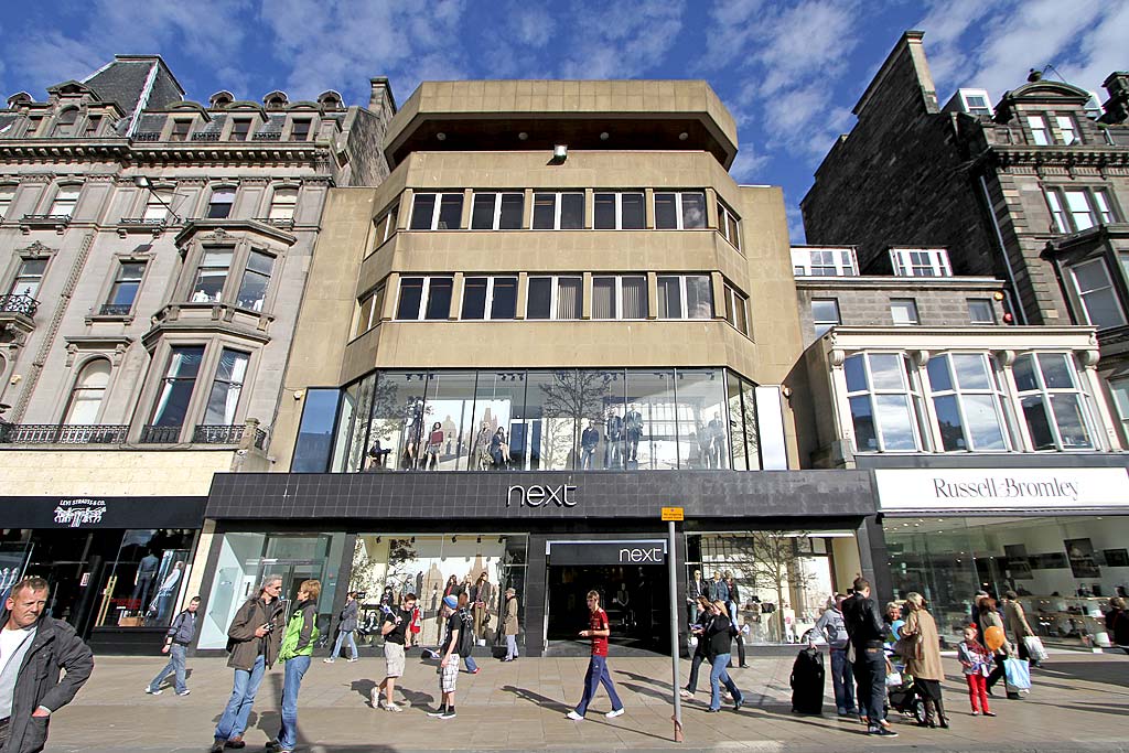 Princes Street Shops,   Nos 106-109 -  Photo taken on the day of the Pope's visit to Edinburgh  -  September 16, 2010