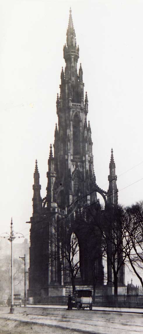 The Scott Monument in Princes Street - and an old car  -  Possibly photographed in the 1920s