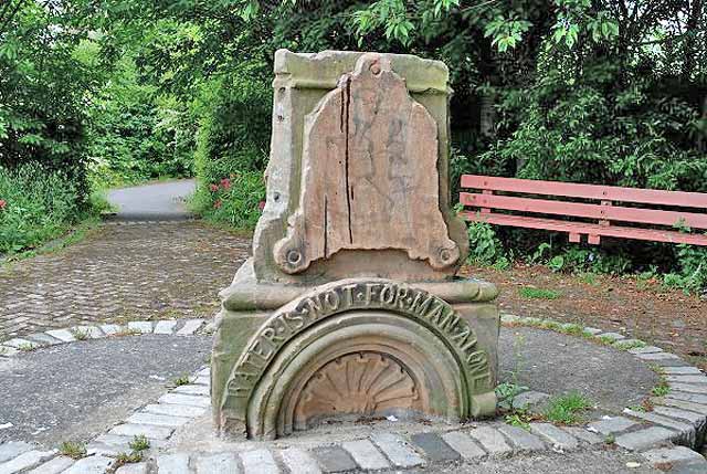 Stones from the Sinclair Fountain, installed beside the cycle path at Steadfastgate, beside Gosford Place, Bonnington, Edinburgh
