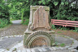 Stones from the Sinclair Fountain, installed beside the cycle path at Steadfastgate, beside Gosford Place, Bonnington, Edinburgh