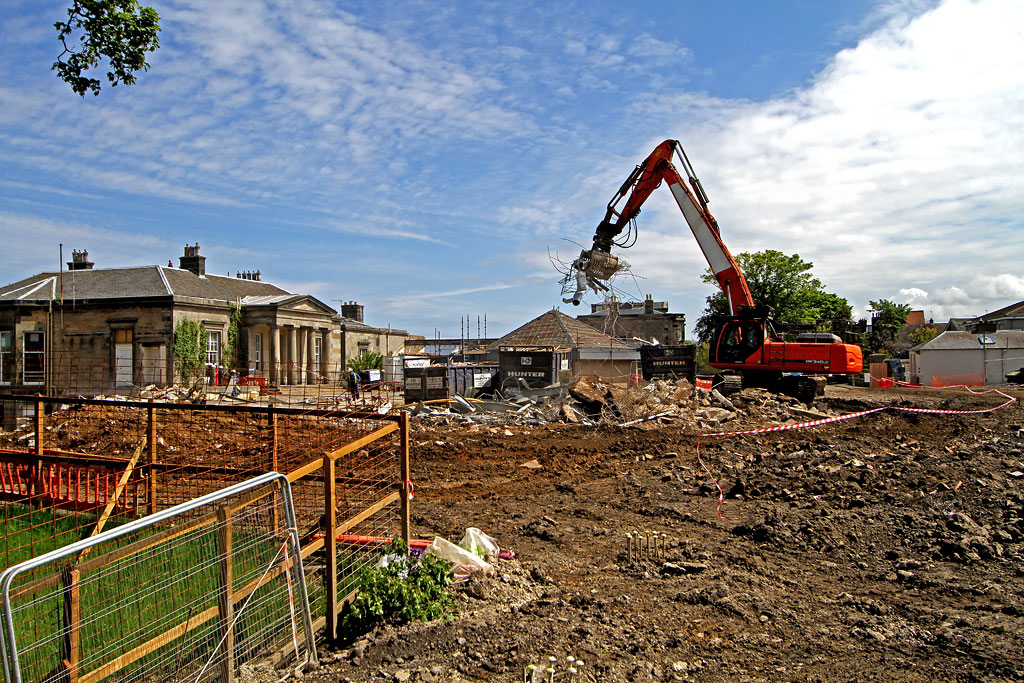 St Columba's Hospice  - Piling work complete and demolition almost complete.  The view opens up to show the C19 Challenger Lodge building, June 2012