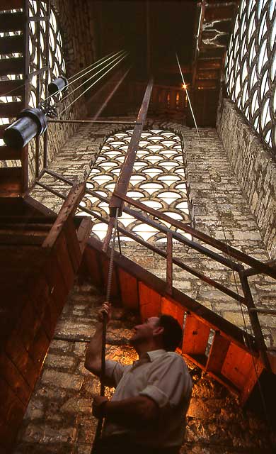 The clock winder raises the weight for the clock at St Stephen's Church, Stockbridge